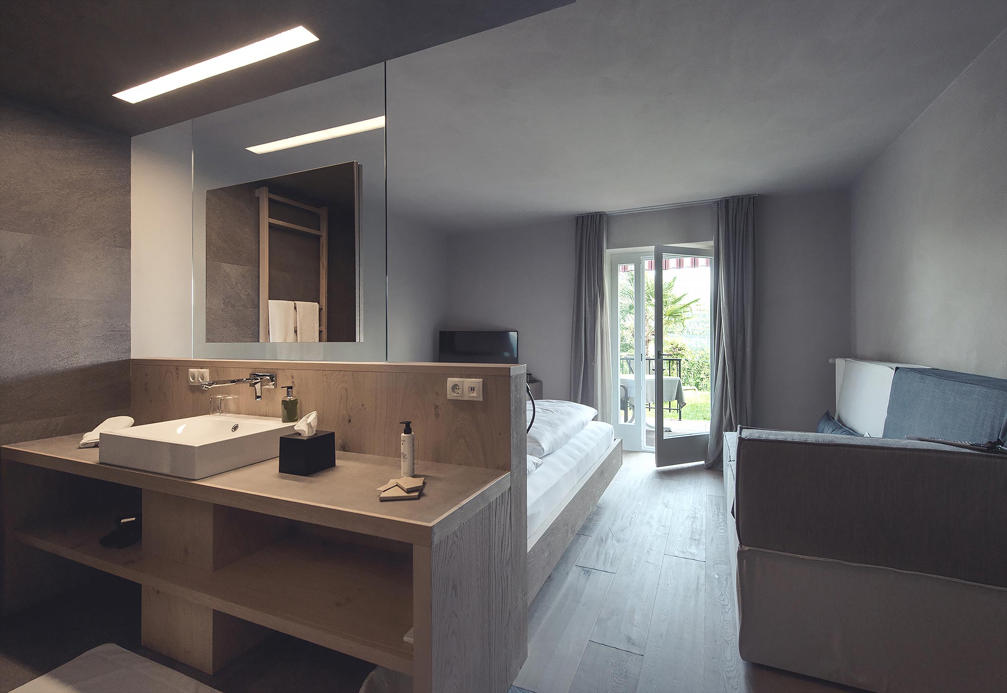 Einzelsuite - Wohnbereich mit Badezimmer